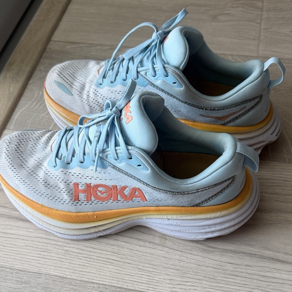 Hoka Sneakers in Light Blue and Orange
9.5 Wide